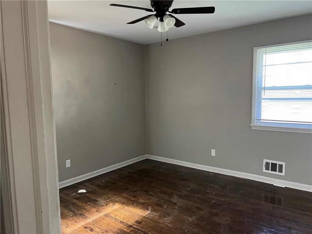 Hardwood floors, white trim and gray walls at 502 NW Central Street, Lee's Summit, MO 64063