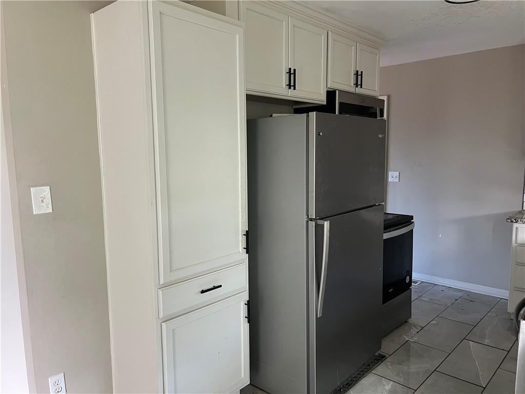 Photo 5 of 13 - 502 NW Central Street, Lee's Summit, MO 64063