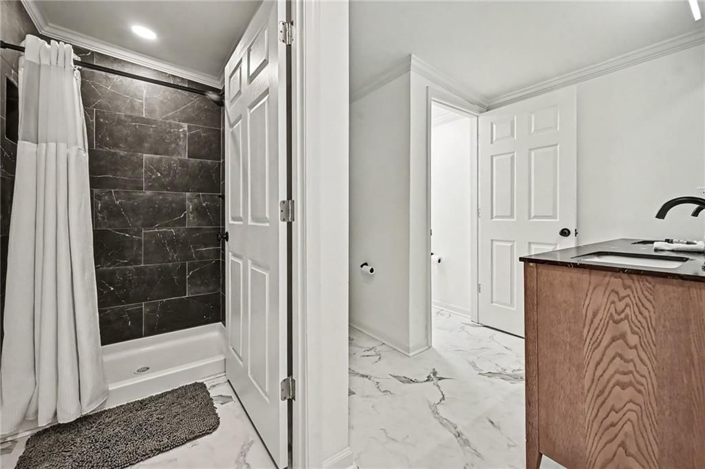 Walk-in shower and tiled shower at 190 4th Street, Holt, MO 64048