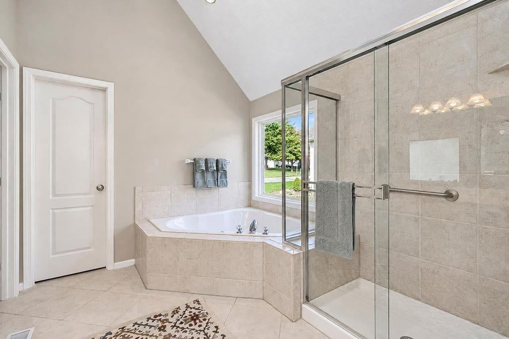 Walk-in shower, tiled shower and frameless glass shower at 9605 NE 100th Street, Kansas City, MO 64157