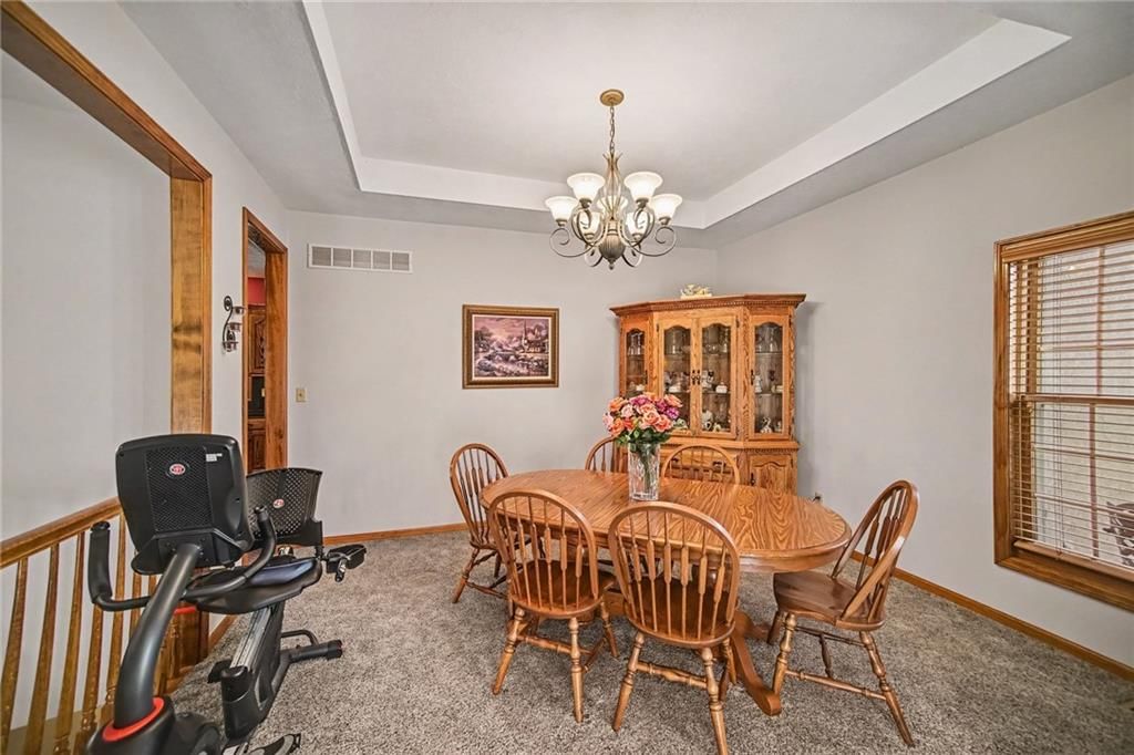 Statement lighting and tray ceiling at 12554 Prestwick Lane, Kansas City, KS 66109