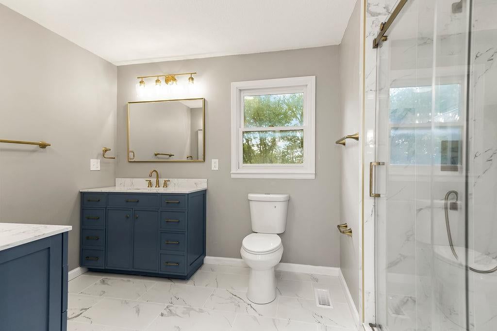 Navy vanity at 13811 West 48th Street, Shawnee, KS 66217