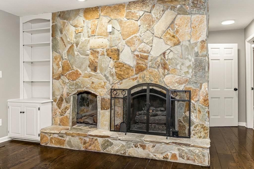 Fireplace and stone fireplace at 13811 West 48th Street, Shawnee, KS 66217