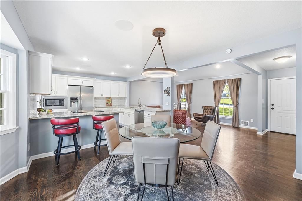 Photo 10: white kitchen cabinets, 8819 HADLEY Street, Overland Park, KS 66212