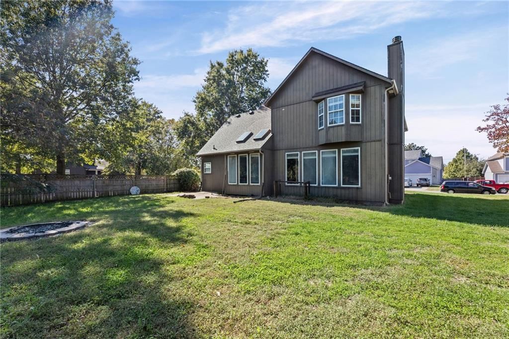 Black exterior windows and mixed exterior materials at 18417 ELM Street, Gardner, KS 66030