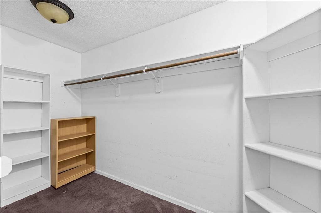 Walk-in closet at 18417 ELM Street, Gardner, KS 66030