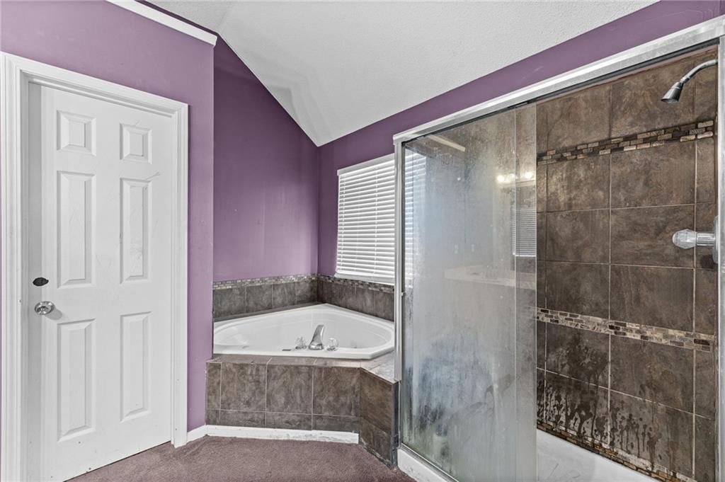 Tiled shower at 18417 ELM Street, Gardner, KS 66030