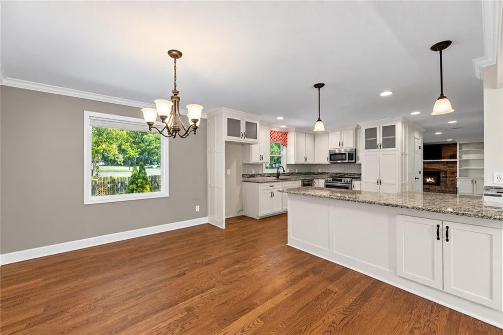 Photo 7: white kitchen cabinets, 16218 W 143rd Terrace, Olathe, KS 66062