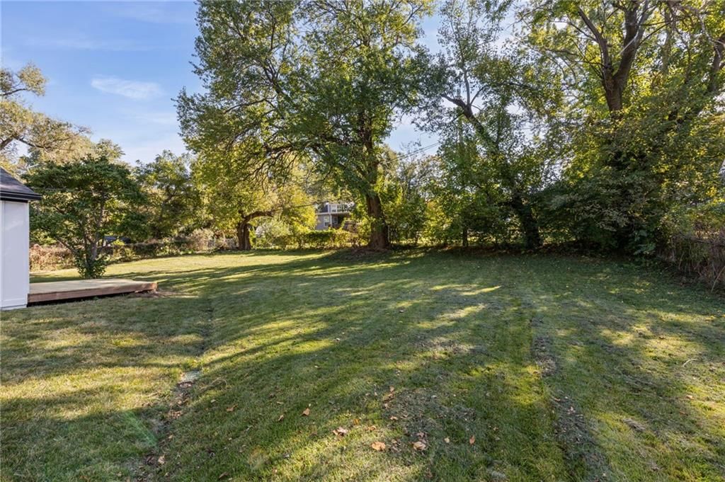 Big backyard, mature trees and flat lot at 6601 W 79th Street, Overland Park, KS 66204
