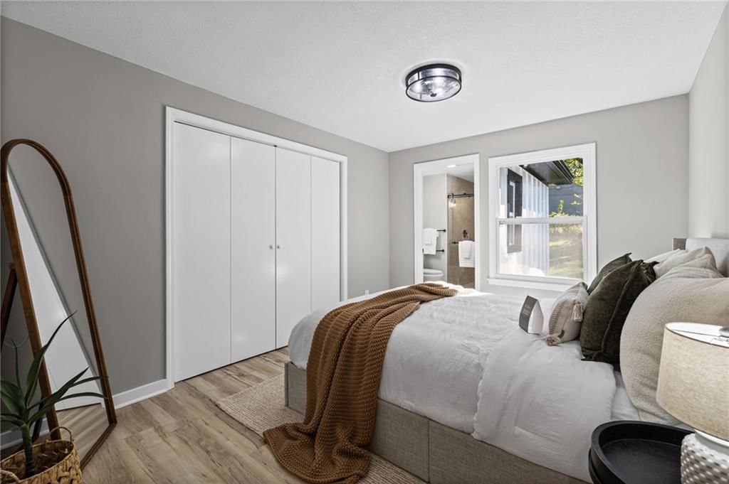 Main-floor primary bedroom at 6601 W 79th Street, Overland Park, KS 66204
