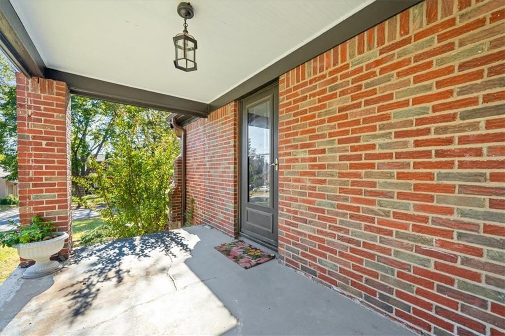 Covered front porch at 2216 Nebraska Avenue, Kansas City, KS 66102