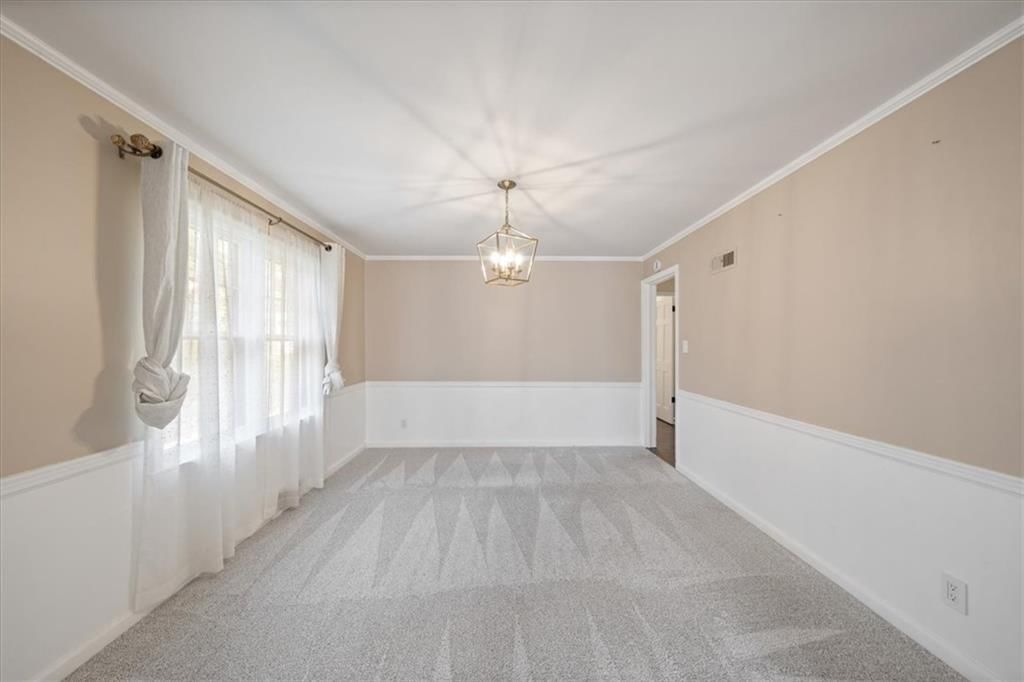 Statement lighting and wainscoting or board and batten at 2216 Nebraska Avenue, Kansas City, KS 66102