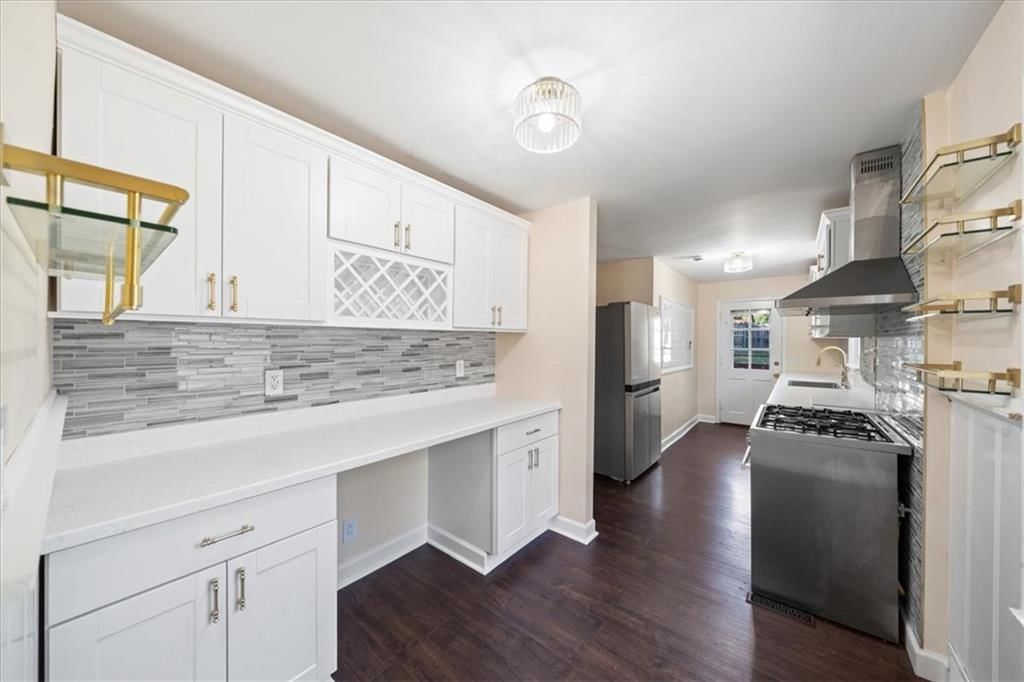White kitchen, shaker cabinets and updated kitchen at 2216 Nebraska Avenue, Kansas City, KS 66102