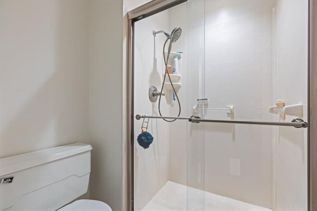 Frameless glass shower at 204 NW Cypress Street, Lee's Summit, MO 64064