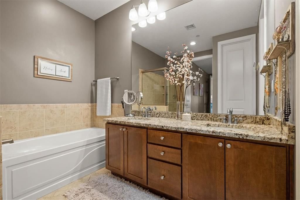 Double vanity and wood vanity at 1101 Walnut Street #609, Kansas City, MO 64106