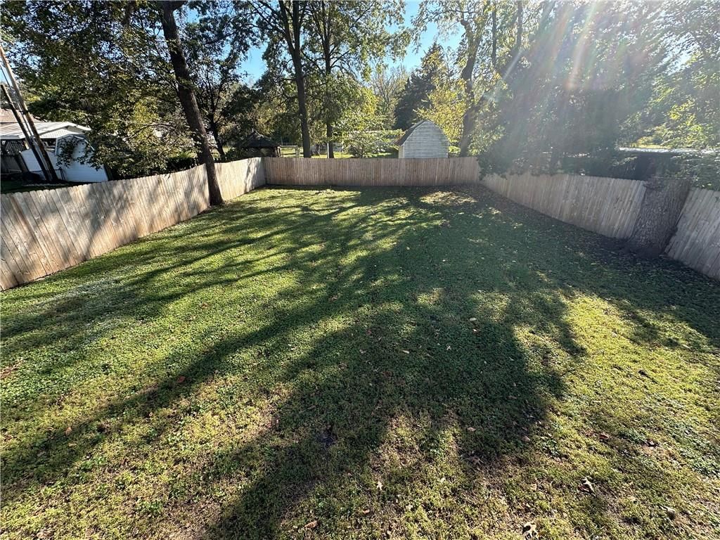 Big backyard and fenced yard at 11113 E 25th Street, Independence, MO 64052