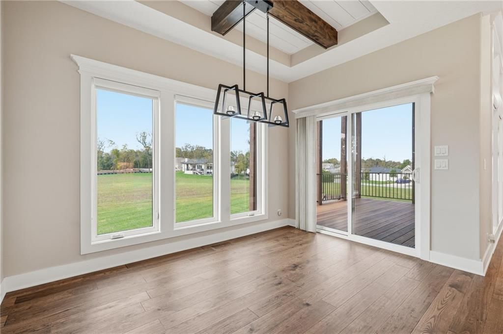 Tray ceiling and breakfast nook at 1 S Buffalo Ridge Court, Lake Winnebago, MO 64034
