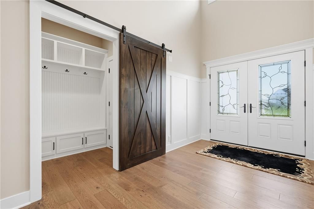 Shiplap / paneling and mudroom built-ins at 1 S Buffalo Ridge Court, Lake Winnebago, MO 64034