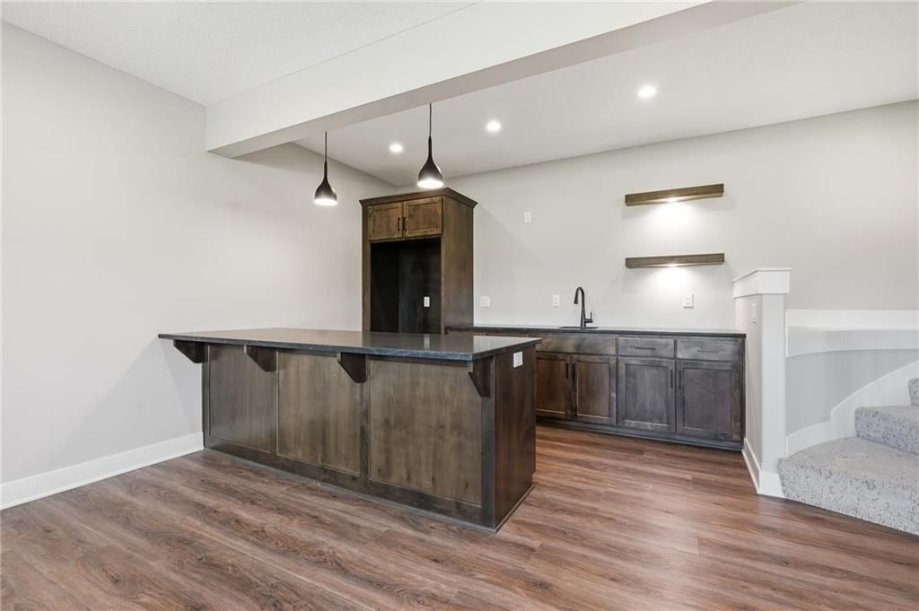 Finished basement and wet bar at 1 S Buffalo Ridge Court, Lake Winnebago, MO 64034