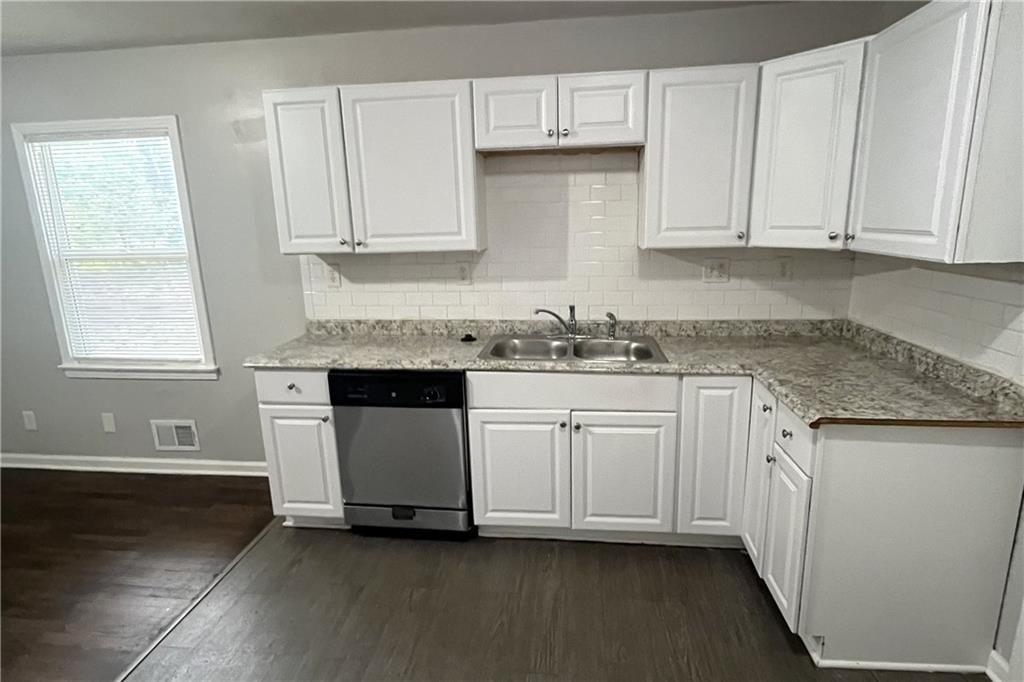 Kitchen backsplash and subway tile backsplash at 7416 Montgall Avenue, Kansas City, MO 64132