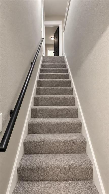 Iron stair railing at 3942 Flora Avenue, Kansas City, MO 64110