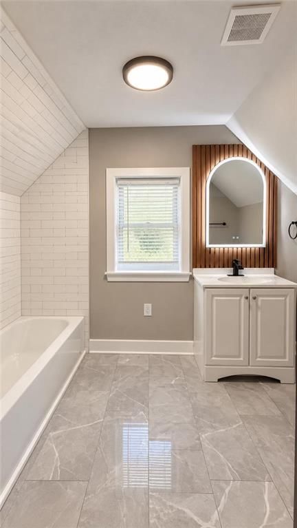 Tiled shower at 3942 Flora Avenue, Kansas City, MO 64110