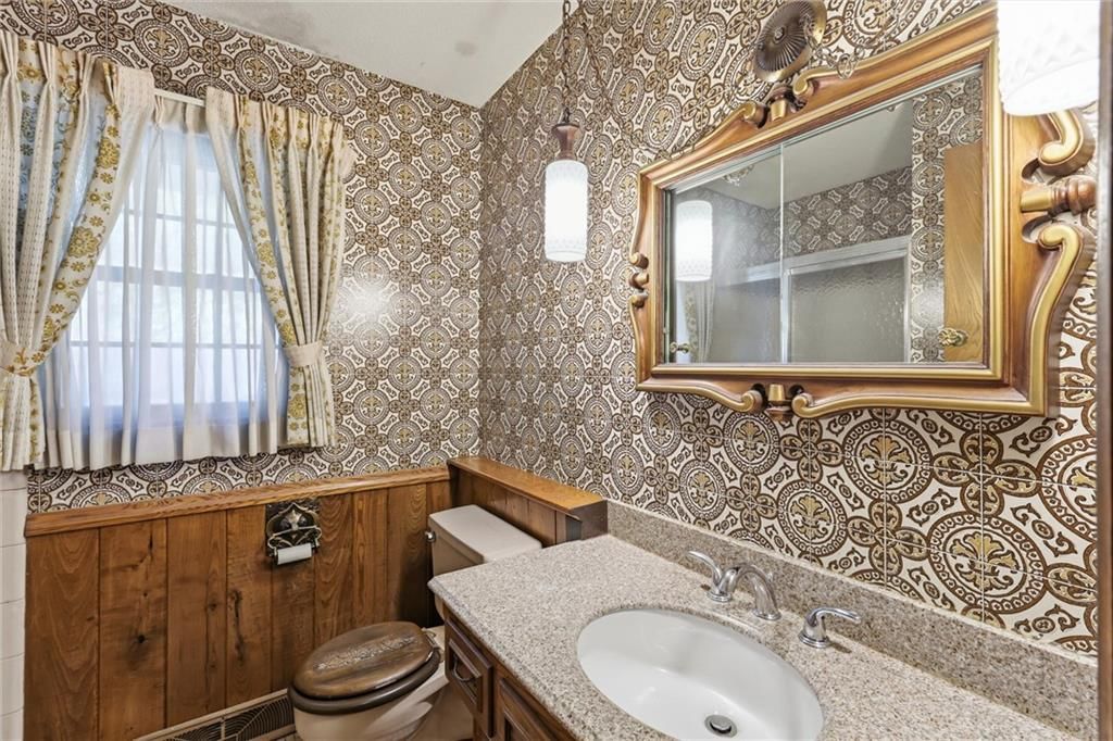 Double vanity and wood vanity at 9209 W 47th Street, Merriam, KS 66203