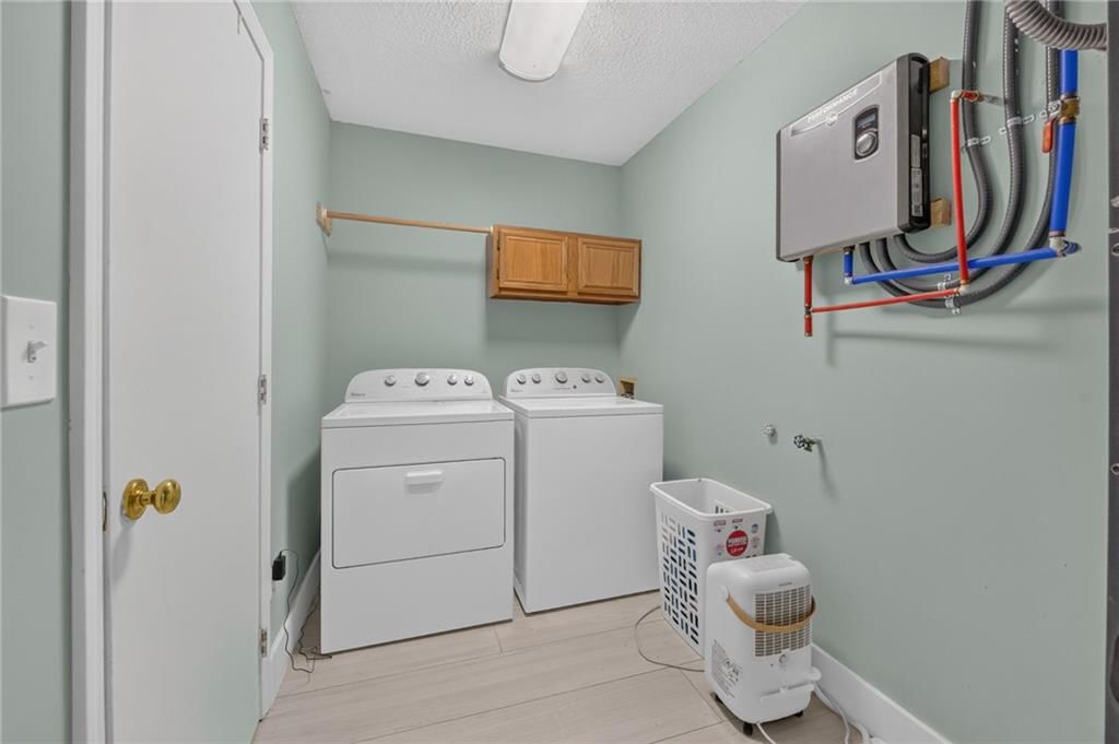 Tankless water heater at 123 E Madison Street, Gardner, KS 66030