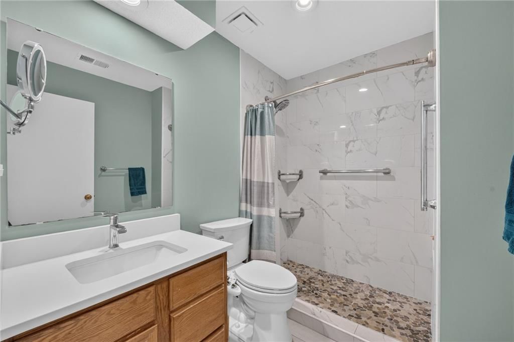 Tiled shower at 123 E Madison Street, Gardner, KS 66030