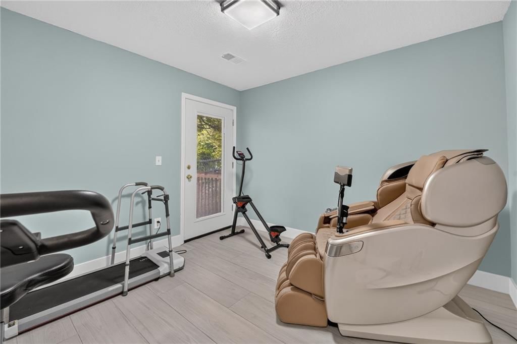 Home gym at 123 E Madison Street, Gardner, KS 66030