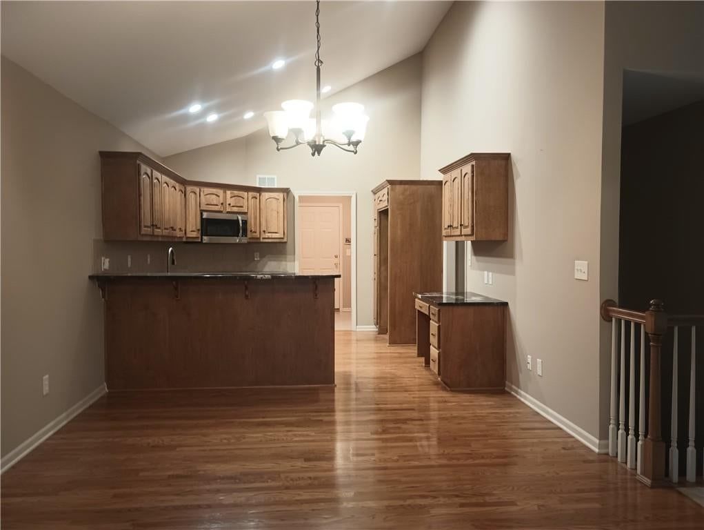 Chandelier, breakfast nook and recessed lighting at 14121 W 152nd Terrace #4003, Olathe, KS 66062