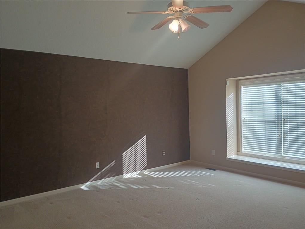 Main-floor primary bedroom and accent wall at 14121 W 152nd Terrace #4003, Olathe, KS 66062