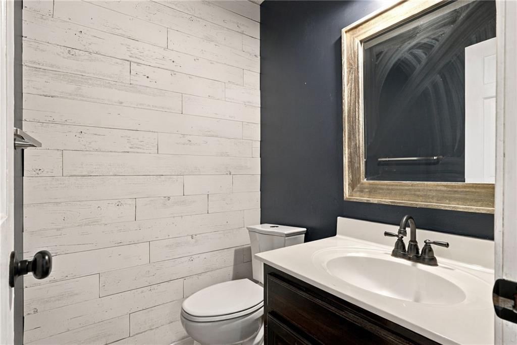 Shiplap / paneling and black hardware at 18107 E 51st Street Court, Independence, MO 64055