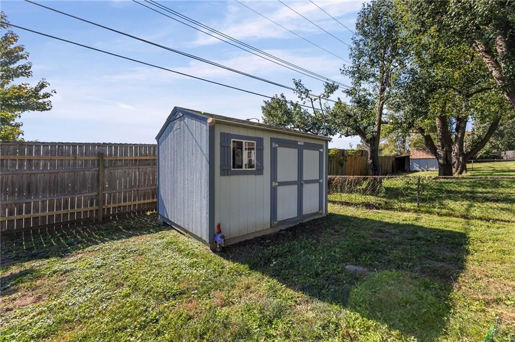 Fenced yard and wood fence at 8809 W 94th Street, Overland Park, KS 66212