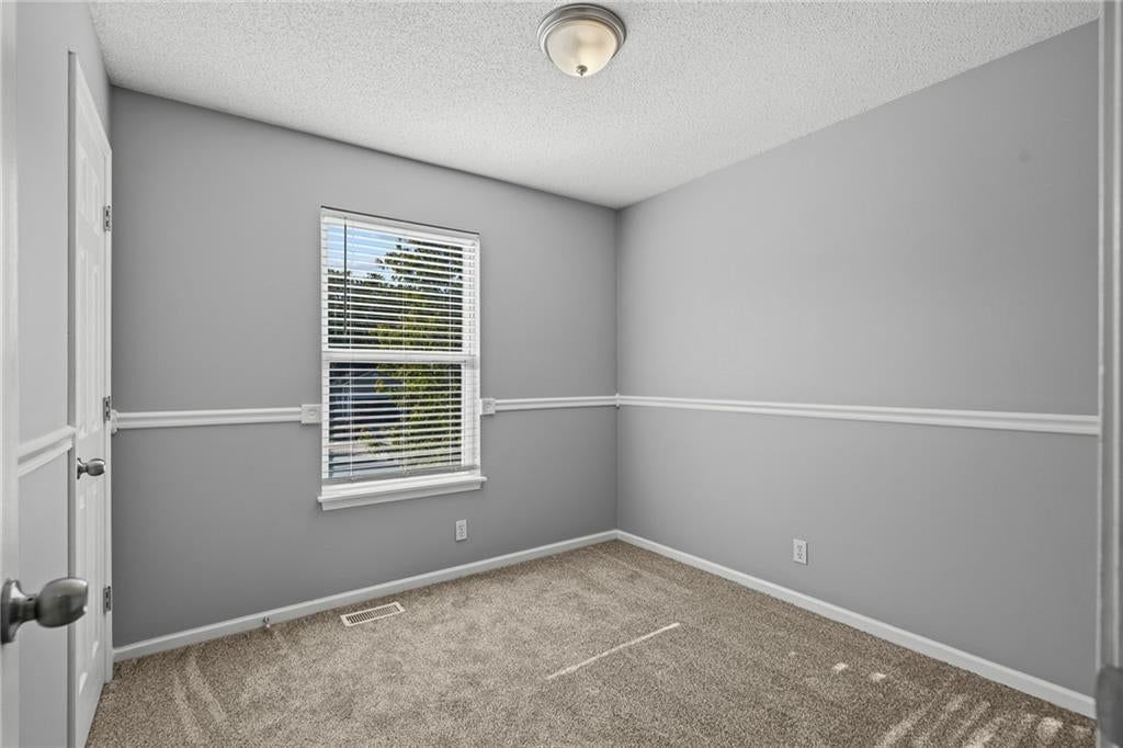 Wainscoting or board and batten at 1122 E Frontier Drive, Olathe, KS 66062