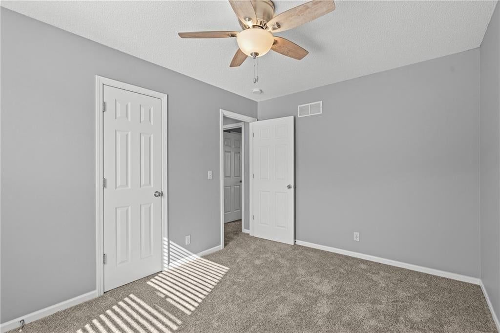 Walk-in closet at 1122 E Frontier Drive, Olathe, KS 66062