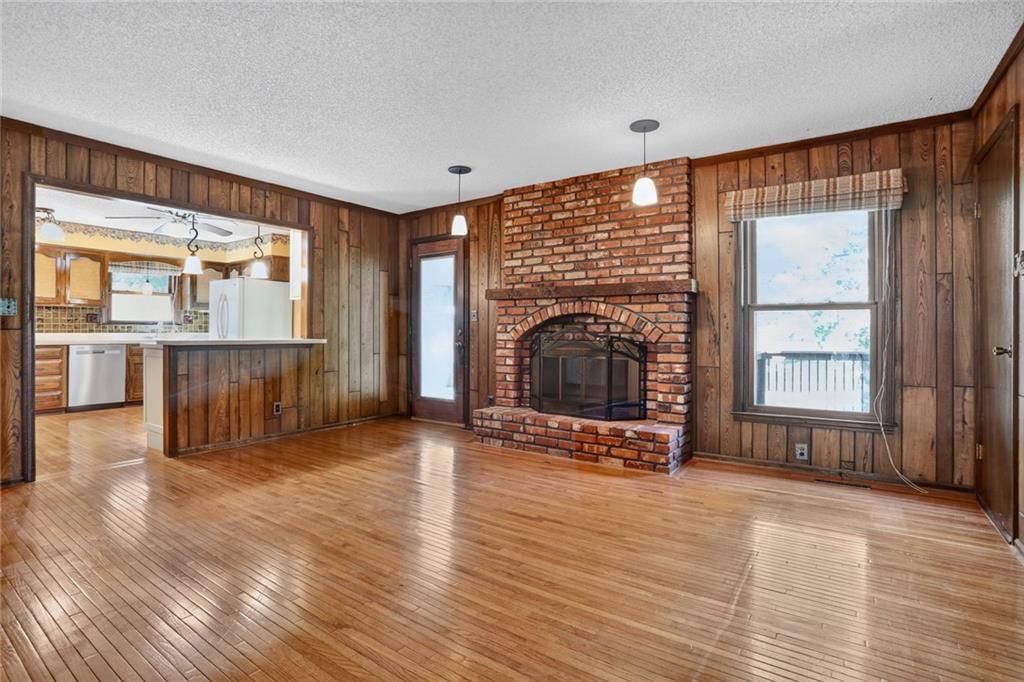 Fireplace, brick fireplace and built-ins at 1528 NE 99th Street, Kansas City, MO 64155