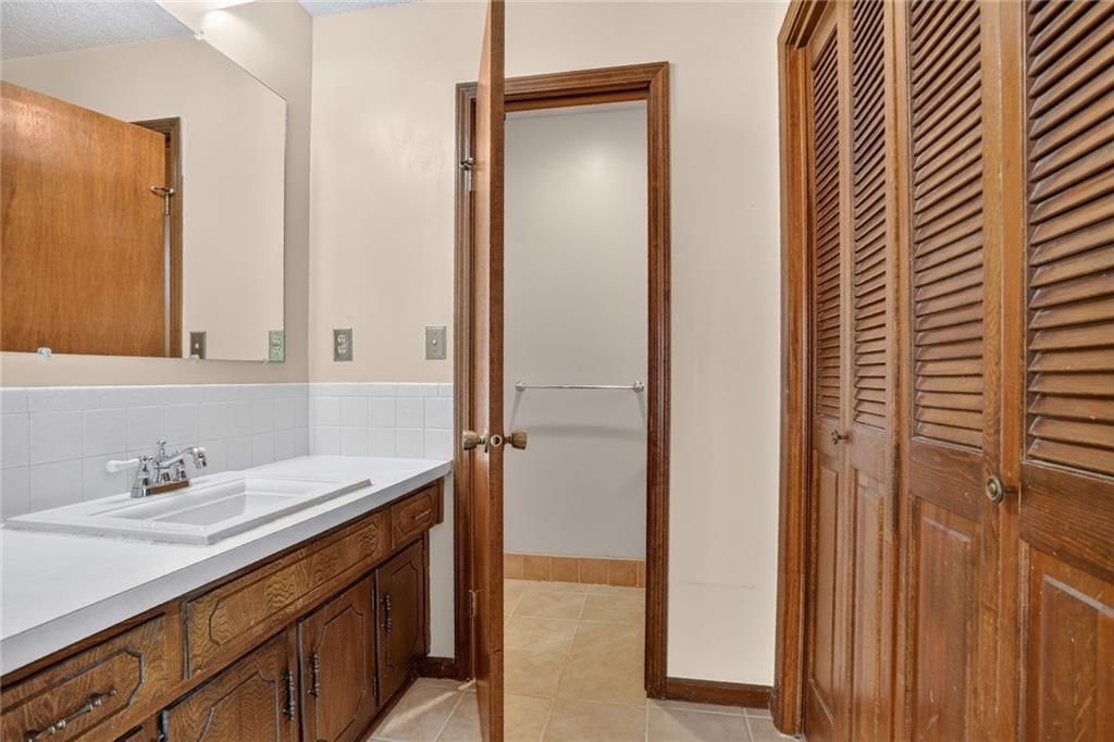 Wood vanity at 1528 NE 99th Street, Kansas City, MO 64155