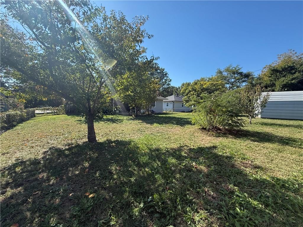 Big backyard and mature trees at 15400 37th Terrace S, Independence, MO 64055