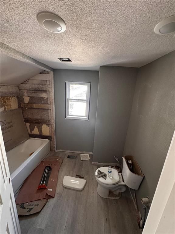 Tiled shower at 4924 Agnes Avenue, Kansas City, MO 64130