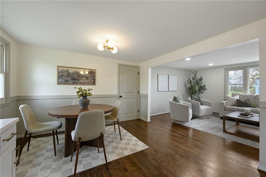 Statement lighting and wainscoting or board and batten at 6813 N Tracy Avenue, Gladstone, MO 64118