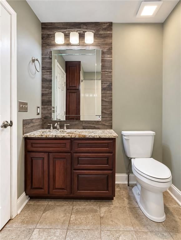 Double vanity and renovated bathrooms at 15109 E 40th Street S, Independence, MO 64055