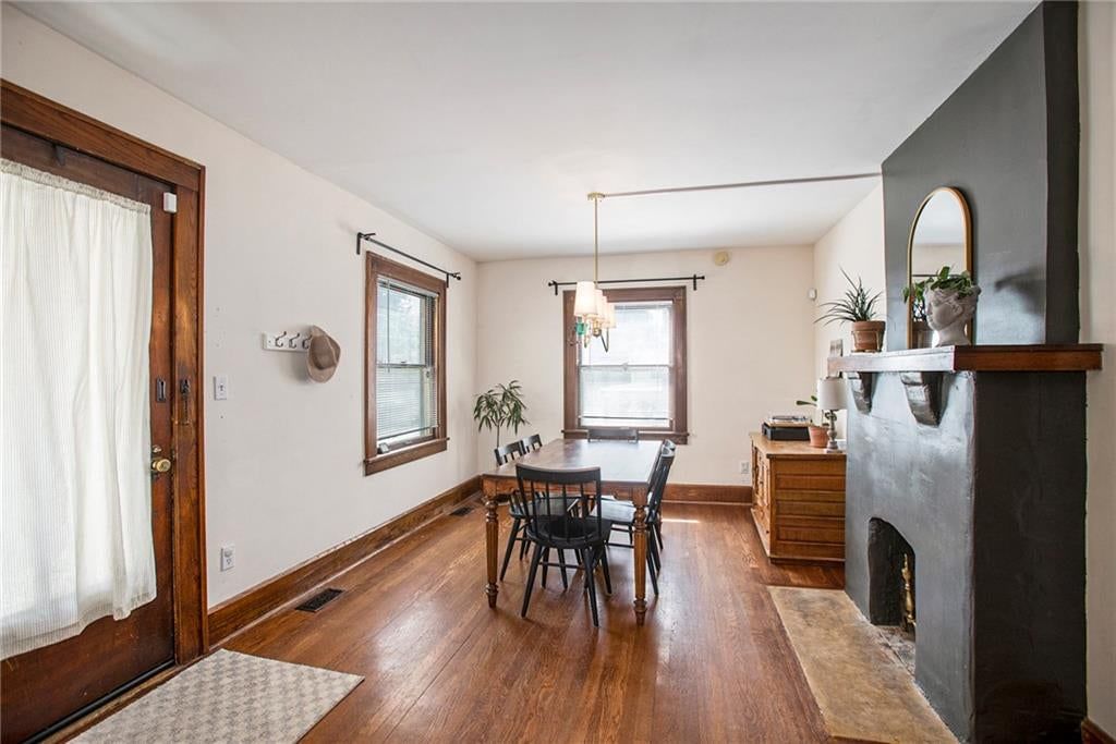 Fireplace, hardwood floors and recessed lighting at 4346 Campbell Street, Kansas City, MO 64110