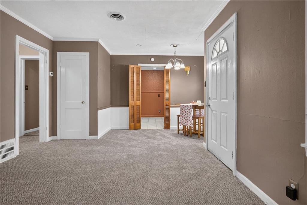 Statement lighting and recessed lighting at 611 W 85th Street, Kansas City, MO 64114