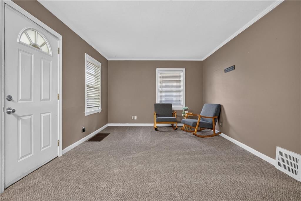 Walk-in closet and carpet at 611 W 85th Street, Kansas City, MO 64114