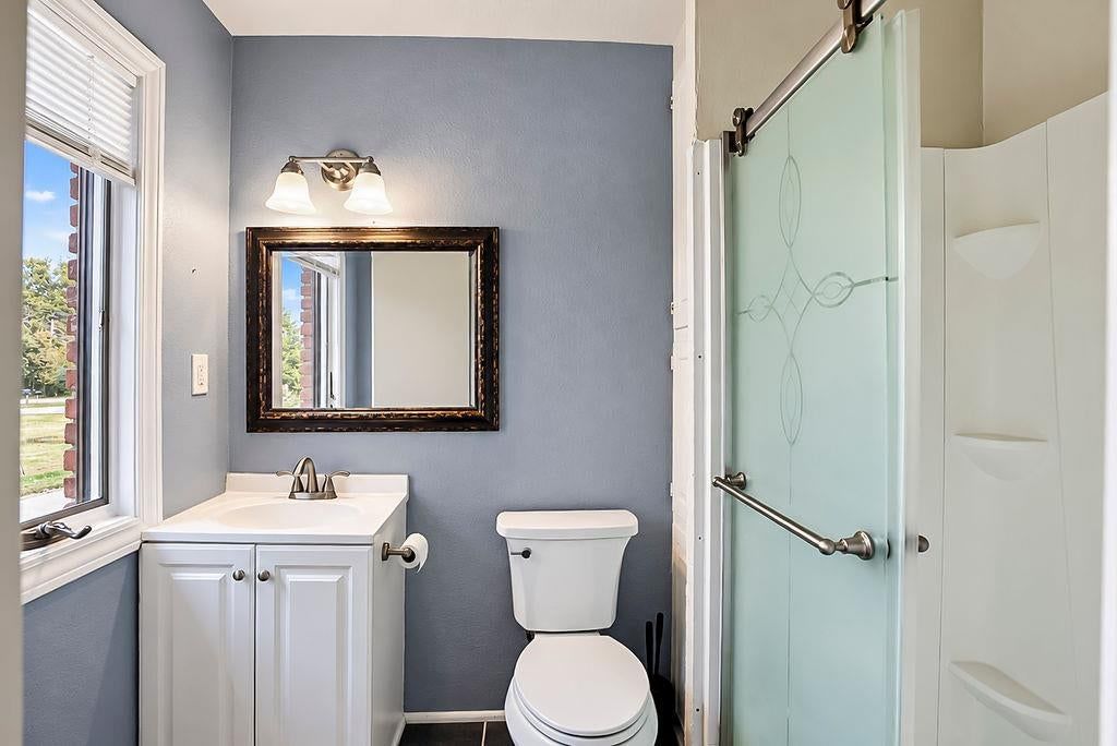Renovated bathrooms at 25025 W 143rd Street, Olathe, KS 66061