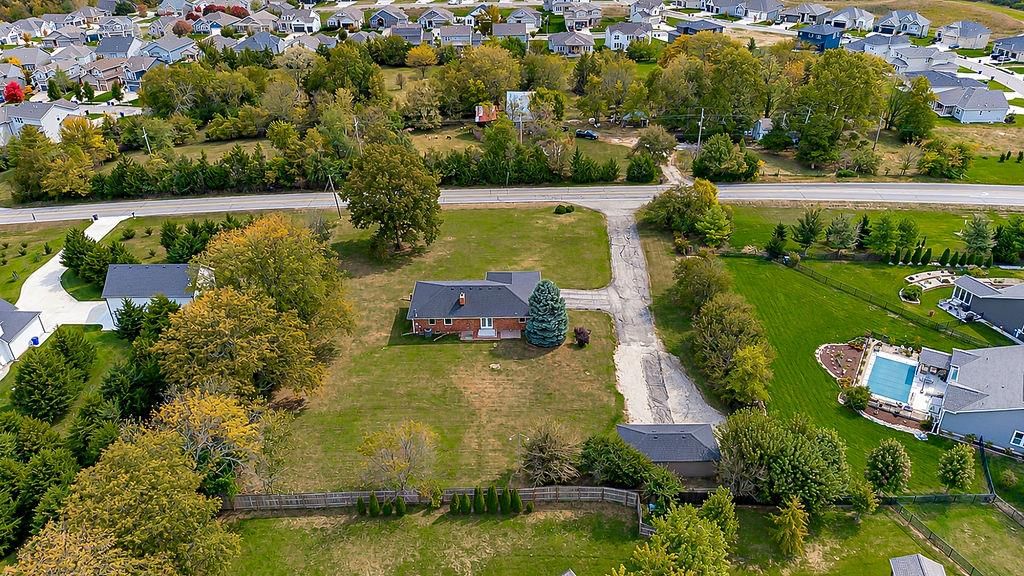 Fenced yard and mixed fence at 25025 W 143rd Street, Olathe, KS 66061