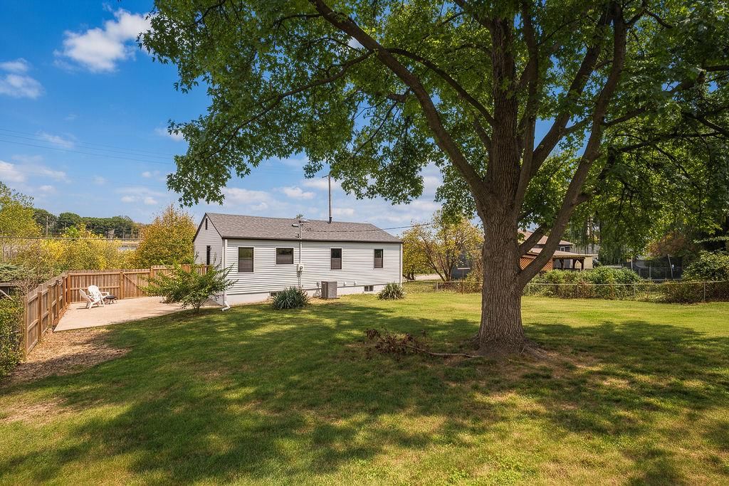 Big backyard and mature trees at 3438 N Brighton Avenue, Kansas City, MO 64117