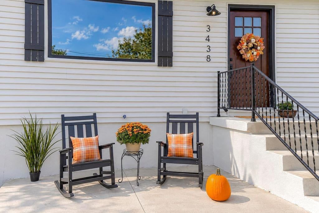 Black window frames at 3438 N Brighton Avenue, Kansas City, MO 64117