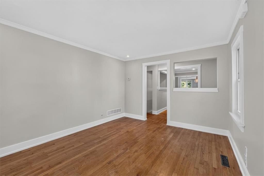 Hardwood floors and white trim at 8016 Robinson Street, Overland Park, KS 66204
